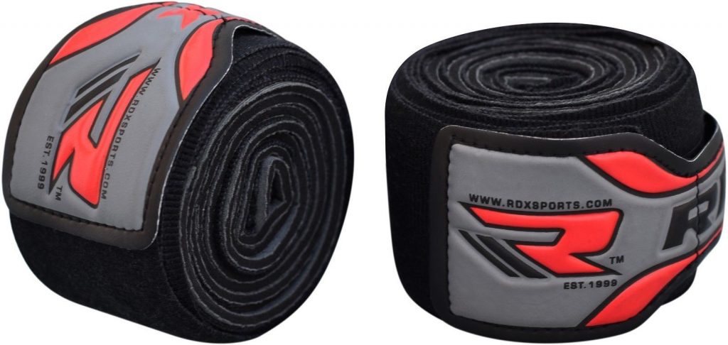 folded black and red hand wraps