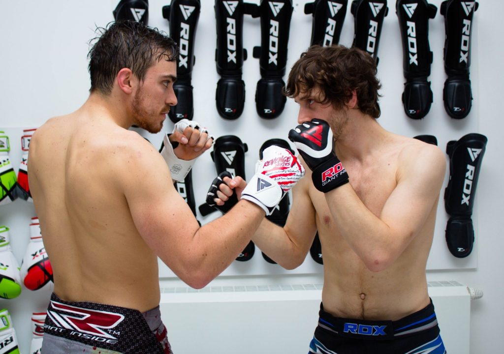 fighters wearing rdx boxing gloves