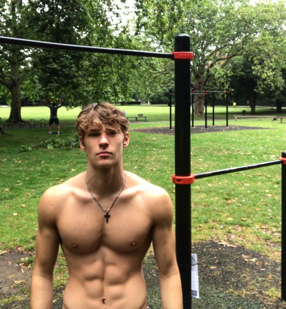 Alex Cowling in park doing Street Lifting