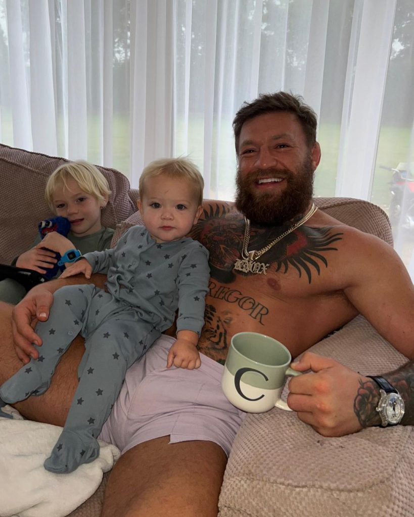 Conor enjoying tea with his children