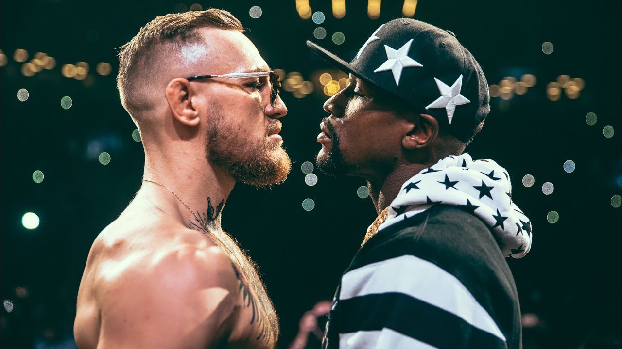 Conor McGregor, Floyd Mayweather facing each other