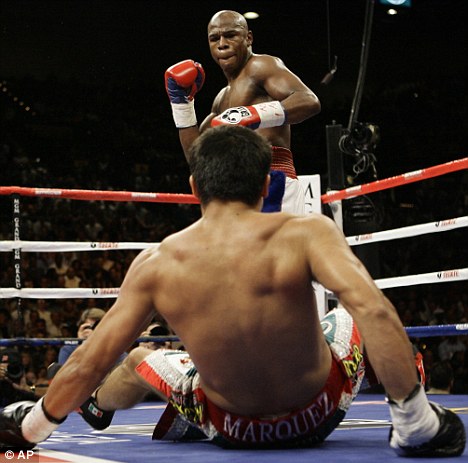 Floyd Mayweather knocks down boxer in a boxing fight