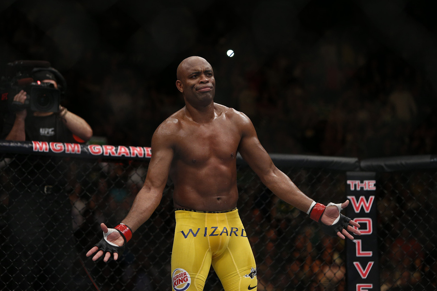Anderson Silva standing inside a UFC octagon during fight