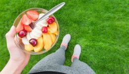person carries bowl fruit diet vs. exercise
