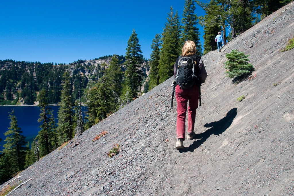 woman hiking with weighted vest