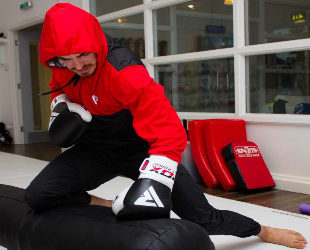 RDX sauna suits used for ground and pound workout