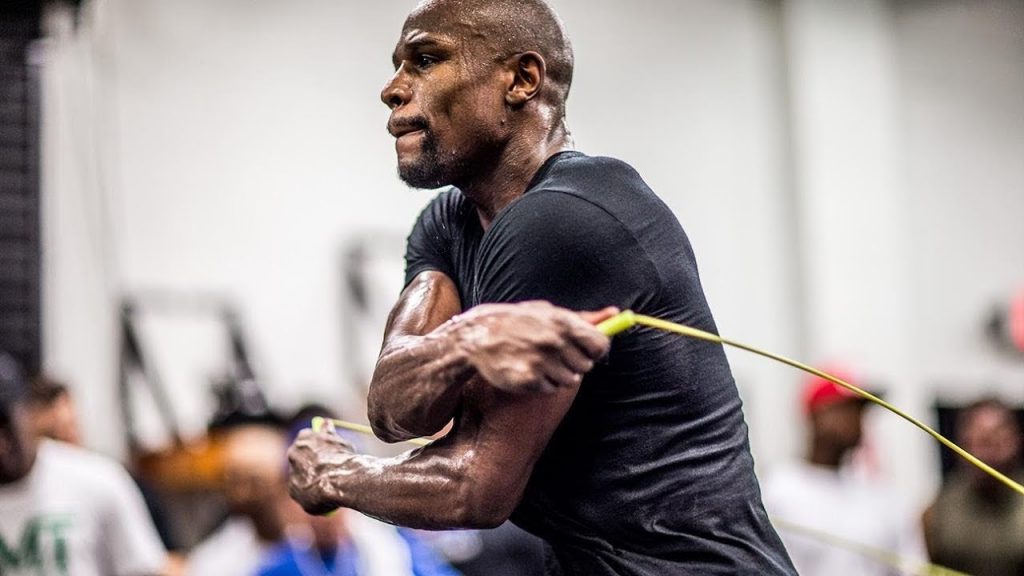 Floyd performing workout with skipping rope