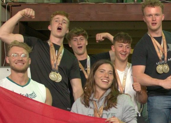 Daan Boger celebrating ISF Open World Street Lifting World Championships 2022 with his teammates
